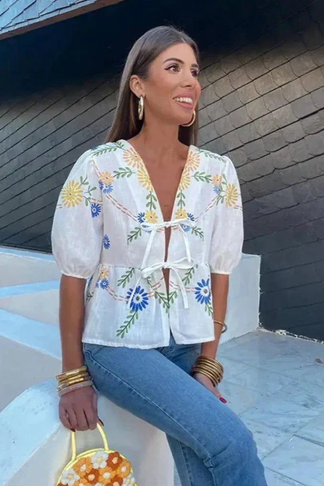 Prestige Mode™ | Blouse Peplum avec Nœud Floral