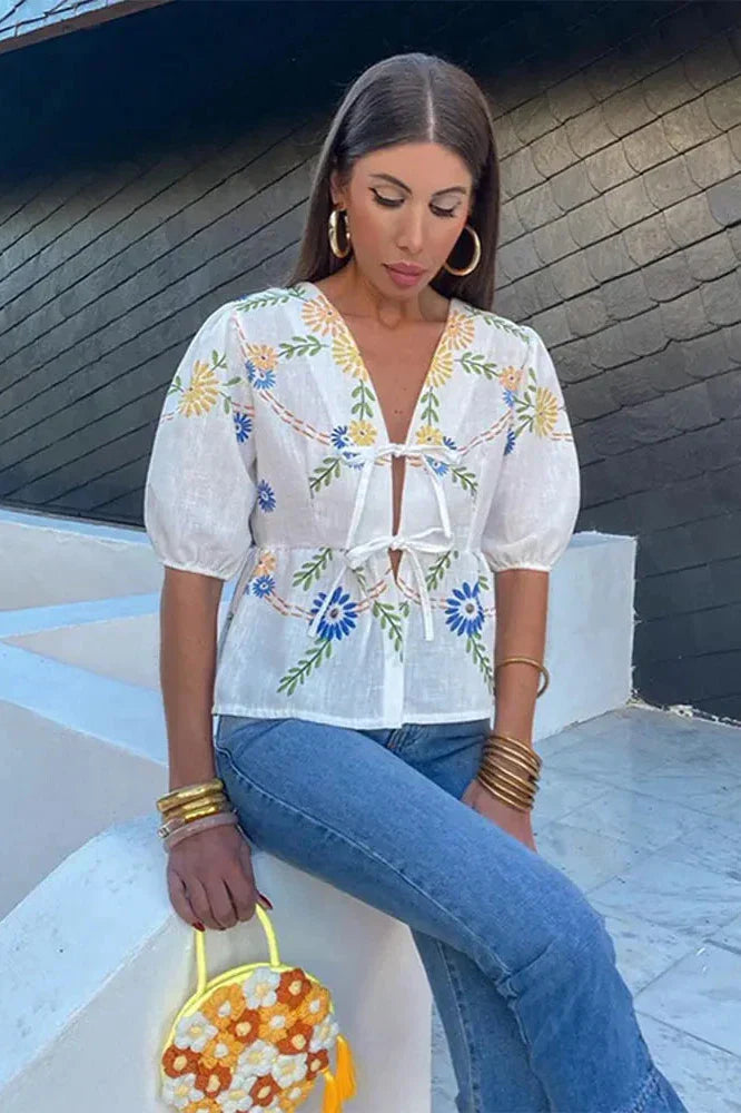 Prestige Mode™ | Blouse Peplum avec Nœud Floral